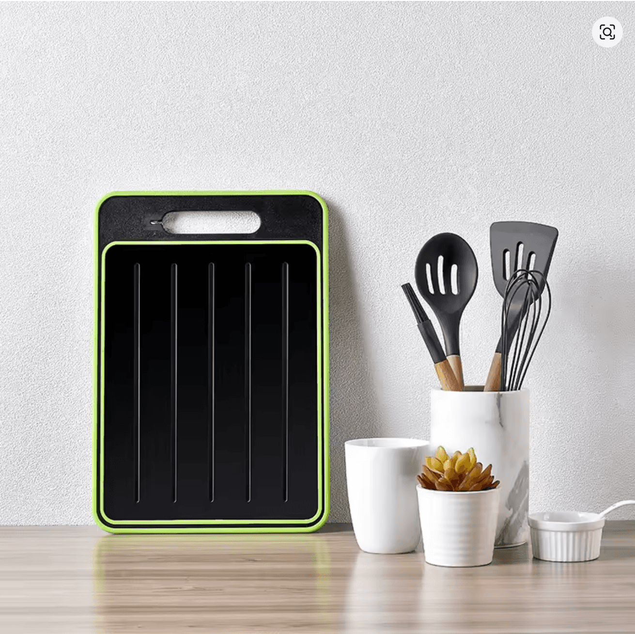 ThawPrep board styled with kitchen utensils